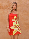 Step into summer with this playful floral printed tube top mini dress. Its vibrant pattern and flattering cut make it the perfect choice for sunny days and warm nights. Lightweight and breezy, it keeps you cool while turning heads wherever you go. Embrace effortless elegance and fun in one chic package!