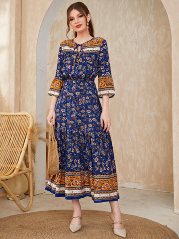 Expertly designed for a chic and stylish look, our Floral Ruffle Hem Dress features a delicate tie neck and playful flounce sleeves. Perfect for any occasion, this dress will have you feeling confident and beautiful. Add a touch of elegance to your wardrobe with this must-have piece.