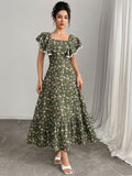 Experience the breathtaking fusion of botanical heritage and sharp, modern architectural tailoring. This stunning ruffled long ensemble is meticulously designed for the woman who values a high-fashion, 
