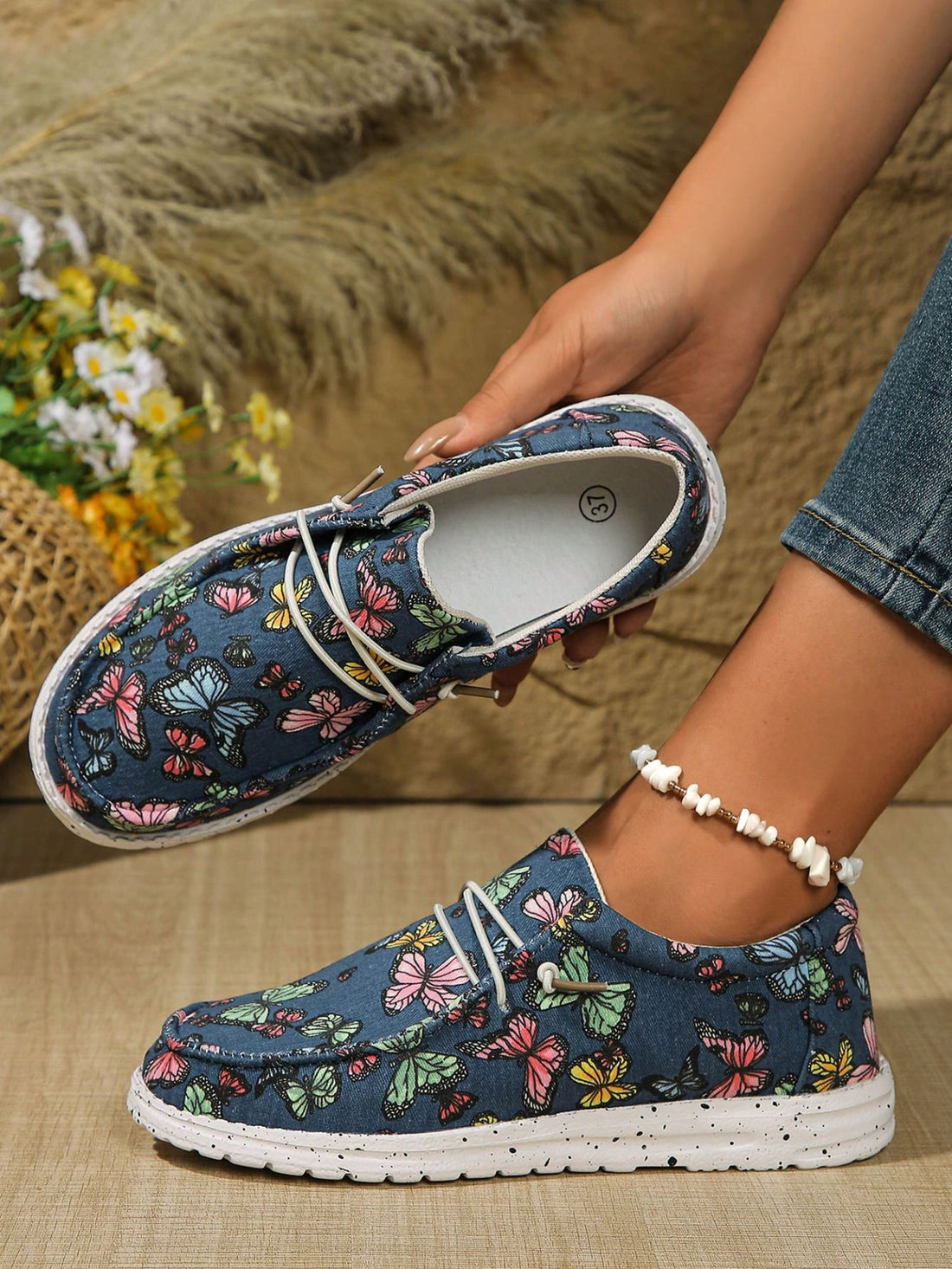 Introducing our Chic Floral Slip-On Shoes, inspired by European and American style. With a sleek and modern design, these shoes are perfect for any fashion-forward individual looking to add a touch of sophistication to their wardrobe. Step into style and embrace the best of both worlds with these slip-ons!