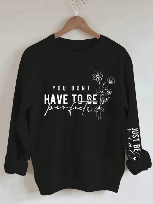 This Chic Floral Slogan Drop Shoulder Sweatshirt effortlessly combines style and comfort for a fashionable spring and autumn look. Featuring a chic floral design and a trendy slogan, this sweatshirt will keep you on-trend while keeping you cozy. Perfect for any casual occasion.