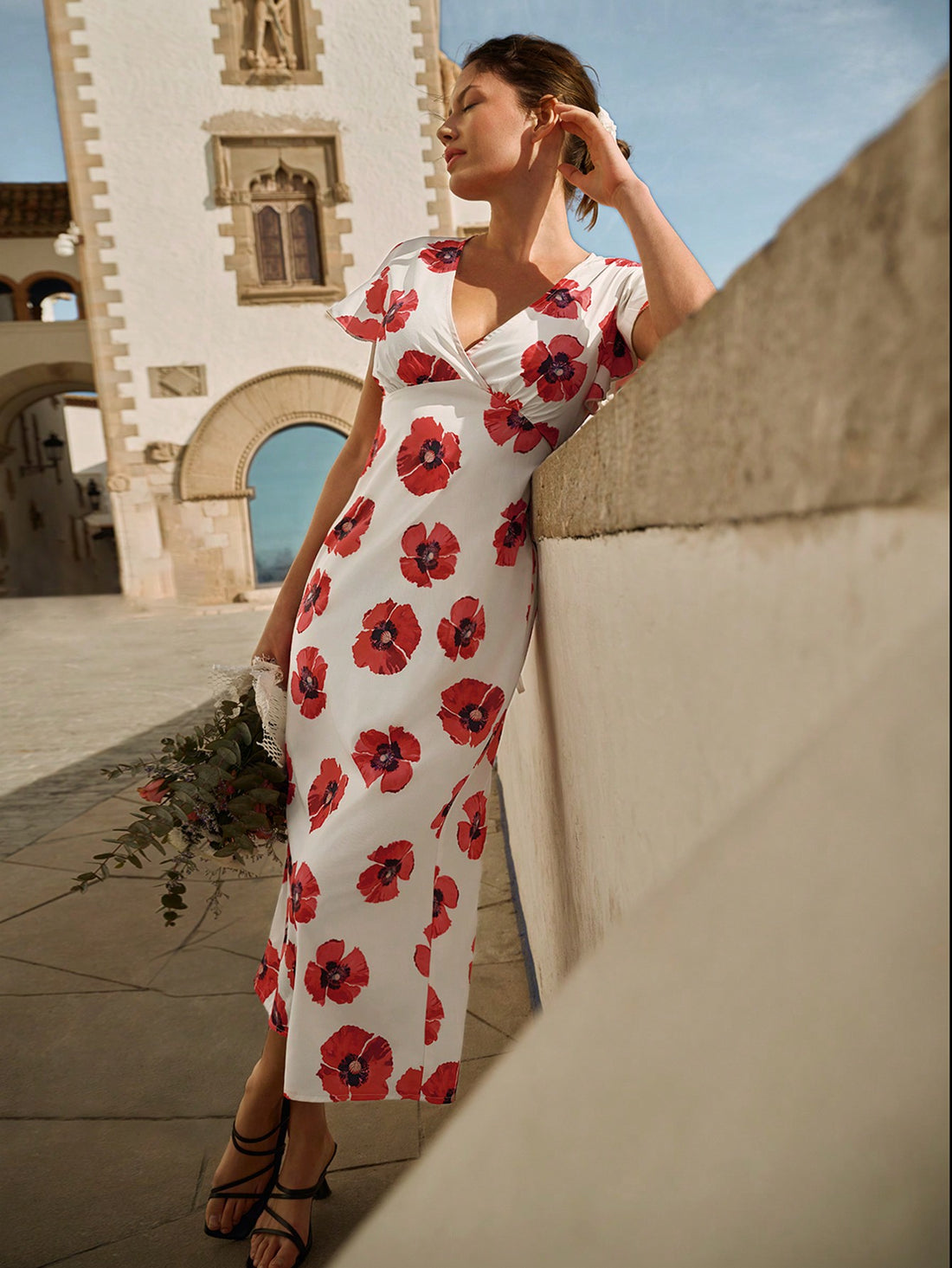 Experience the best of spring and summer with our Chic Floral V-Neck Dress. With its ruffled sleeves and elegant floral design, you'll effortlessly stand out in any occasion. Whether it's a garden party or a day out, this dress is perfect for adding a touch of whimsy and charm to your look.