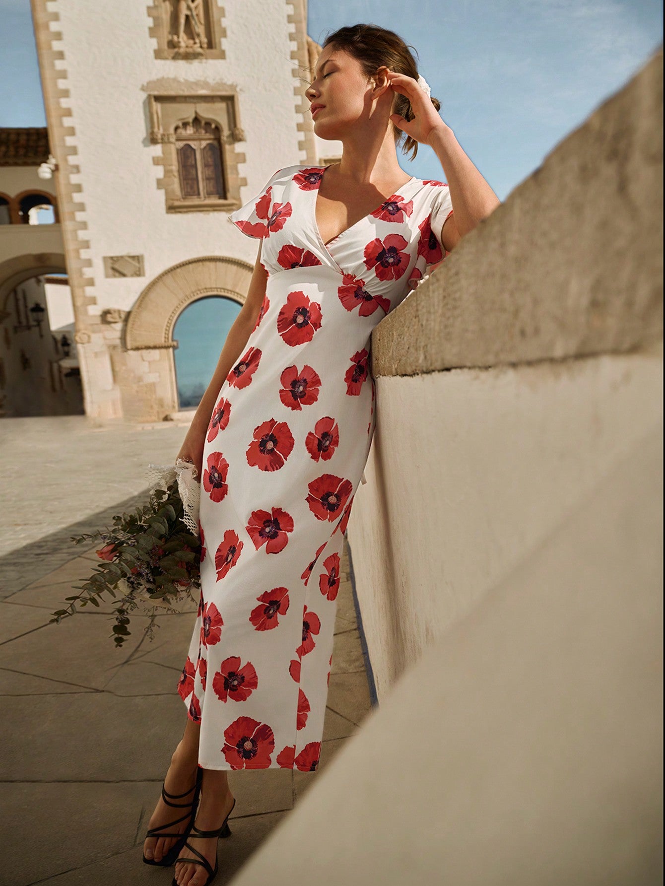 Experience the best of spring and summer with our Chic Floral V-Neck Dress. With its ruffled sleeves and elegant floral design, you'll effortlessly stand out in any occasion. Whether it's a garden party or a day out, this dress is perfect for adding a touch of whimsy and charm to your look.
