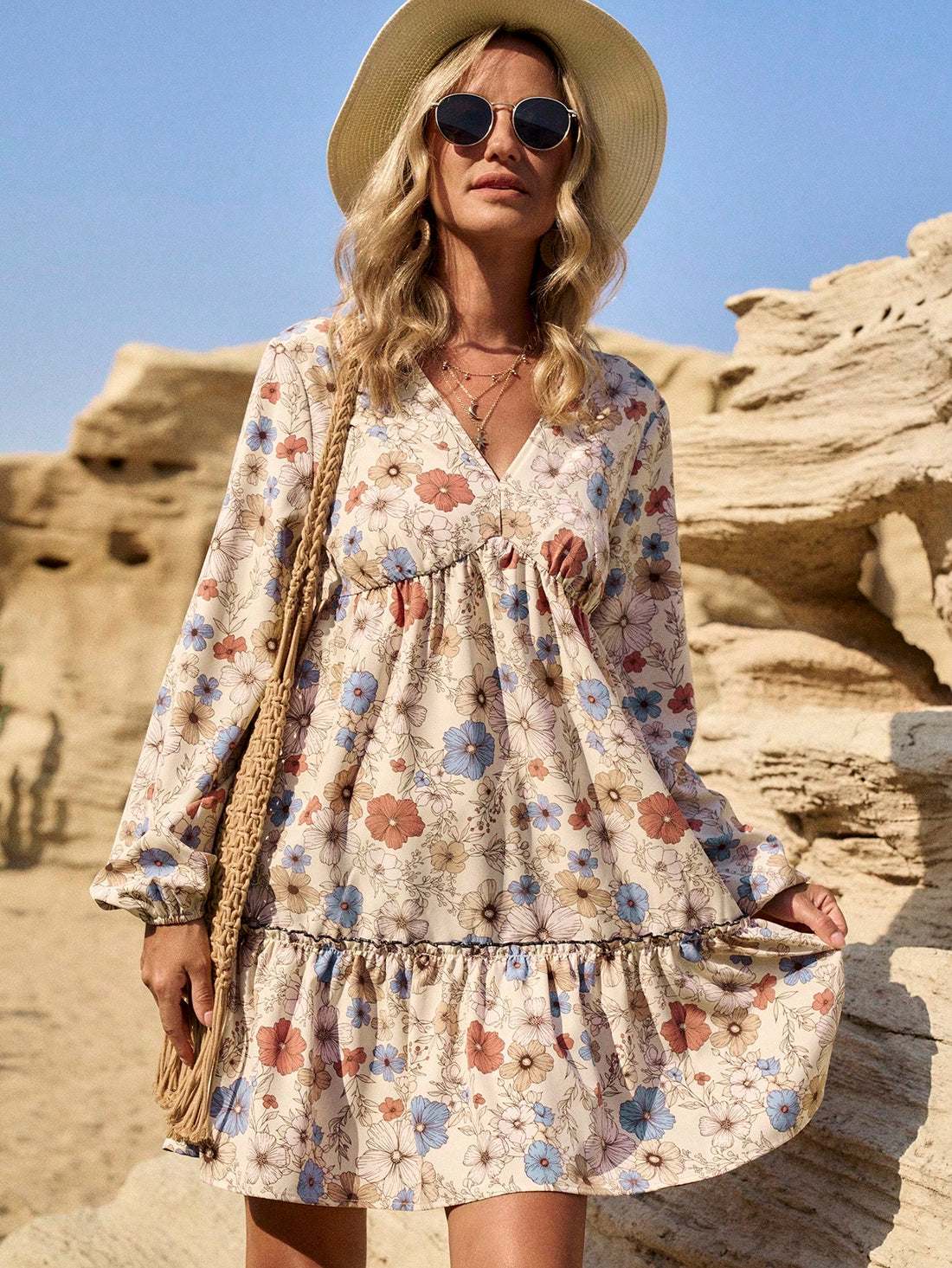 Get ready to turn heads in this Chic Floral V-Neck Ruffle Trim Long Sleeve Dress! With its playful and flirty ruffle trim and vibrant floral print, this dress is perfect for any casual vacation. Its lightweight fabric and long sleeves make it versatile for any weather. Say hello to your new go-to outfit!
