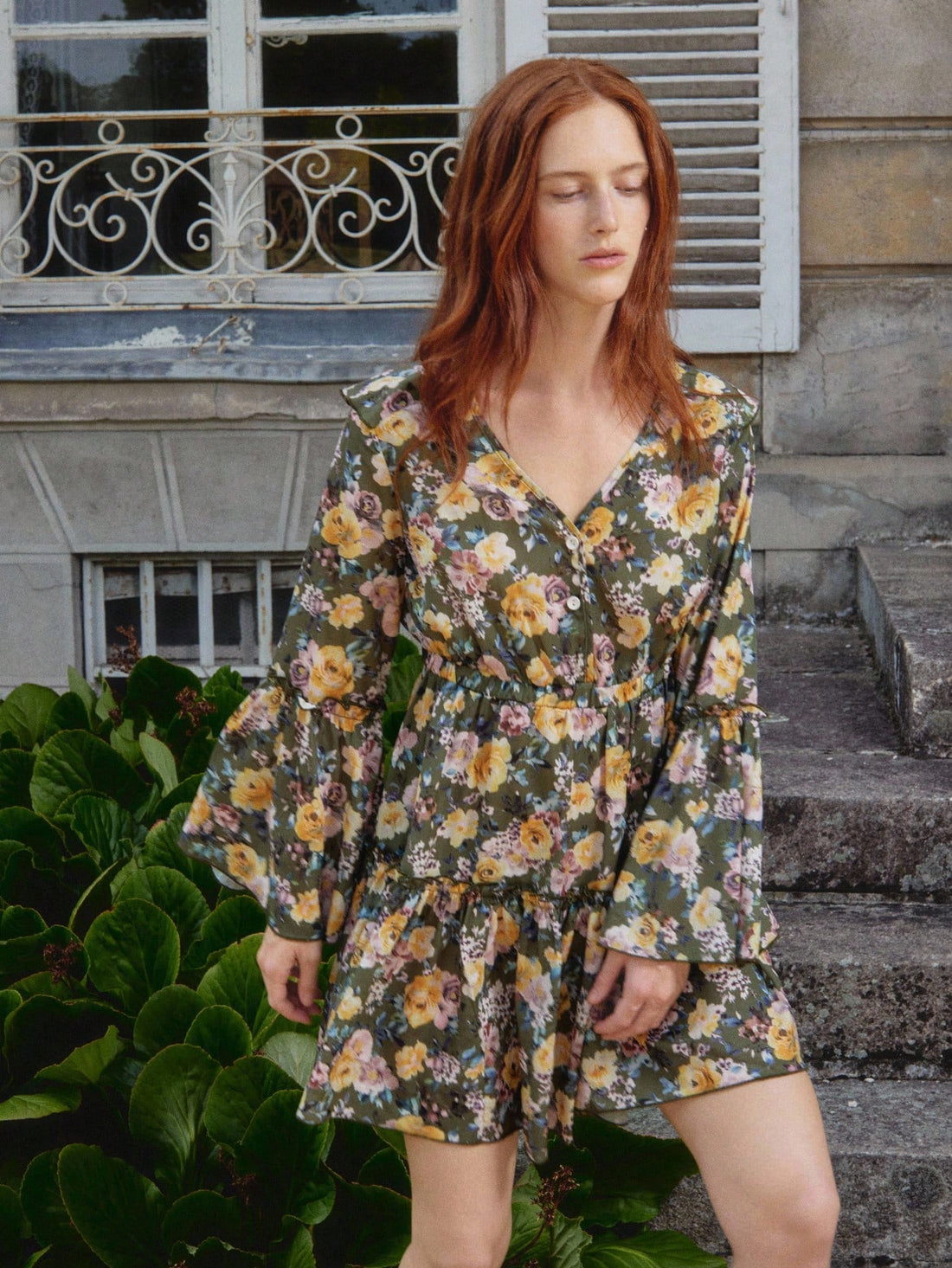 Twirl into autumn with this charming floral mini dress that captures vintage vibes with a modern twist. The delicate ruffled flared sleeves add a playful touch, while the cheerful floral print brings instant personality to your wardrobe. Perfect for casual outings, garden parties, or whenever you want to channel effortless elegance. This dress pairs beautifully with sneakers for a laid-back look or dress it up with boots for evening adventures. A timeless piece that celebrates your unique style.