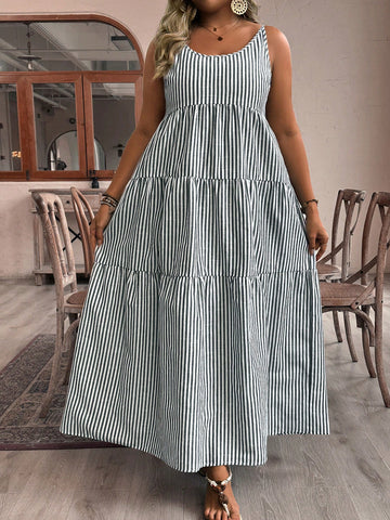 Get ready to strut your stuff in this Chic & Flowy Plus Size Striped Ruffle Hem Cami Dress. With its eye-catching stripes and playful ruffle hem, this dress is sure to turn heads. The flowy fit and comfortable fabric make it perfect for any occasion. Time to dress to impress (and have some fun)!