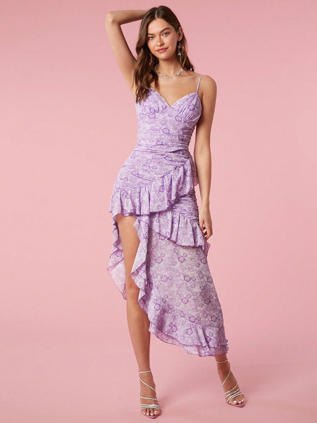 Be a summertime stunner in our Chic & Flowy dress! With vibrant digital prints and spaghetti straps, this asymmetrical dress is perfect for any occasion. Slip it on and let the flowy fabric and playful design make you the talk of the town. Twirl away, girl!