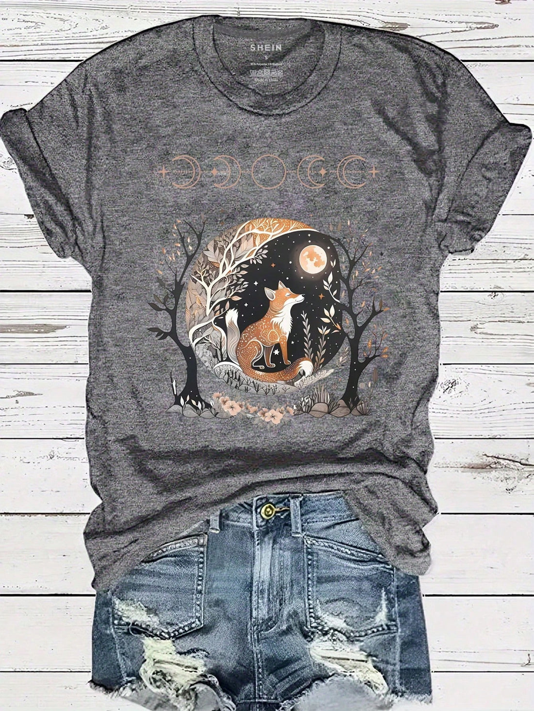 Roam the streets in style with our Chic Fox Graphic Tee for Women. This trendy and stylish casual top features a charming fox design, making it a playful addition to any outfit. Embrace your inner fashionista and turn heads with this must-have tee!