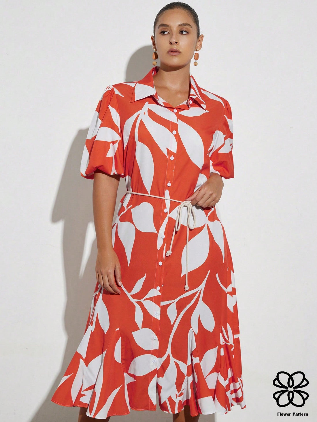 Step out in style with this playful French-inspired mini dress, featuring a charming floral print and a flattering cinched waist. The short sleeves add a breezy touch, making it perfect for sunny days or lively evenings. Effortlessly chic and fun, this dress brings a touch of Parisian flair to your wardrobe.