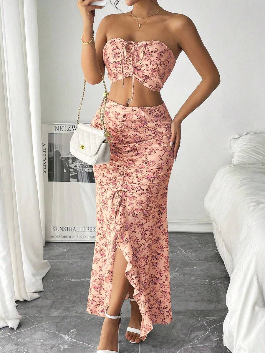 Embrace Parisian elegance with this charming two-piece set. The delicate ditsy floral bandeau top offers a romantic, feminine silhouette perfect for warm weather, while the split hem skirt adds movement and modern flair. Lightweight and breathable, this coordinated set transitions effortlessly from casual daytime looks to relaxed evening outings. Ideal for those seeking timeless French-inspired style with contemporary edge.