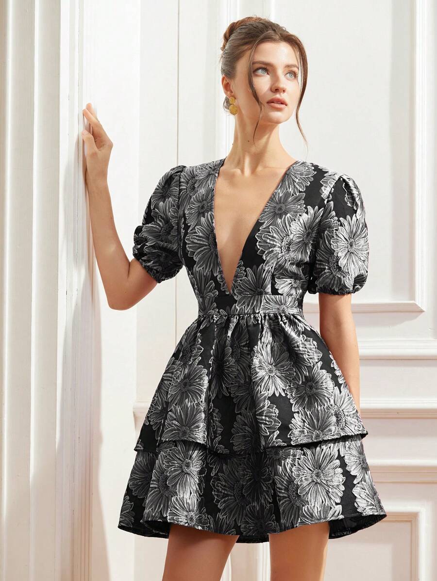 Step into vintage elegance with this show-stopping mini dress that channels timeless French sophistication. The striking purple-red chrysanthemum print brings artistic flair, while dramatic puff sleeves add a playful touch of romance. A daring deep V-neckline creates instant allure and flatters beautifully. Perfect for date nights, brunch outings, or whenever you want to turn heads with retro-inspired style that feels fresh and modern. This dress proves that classic never goes out of fashion—it just gets be