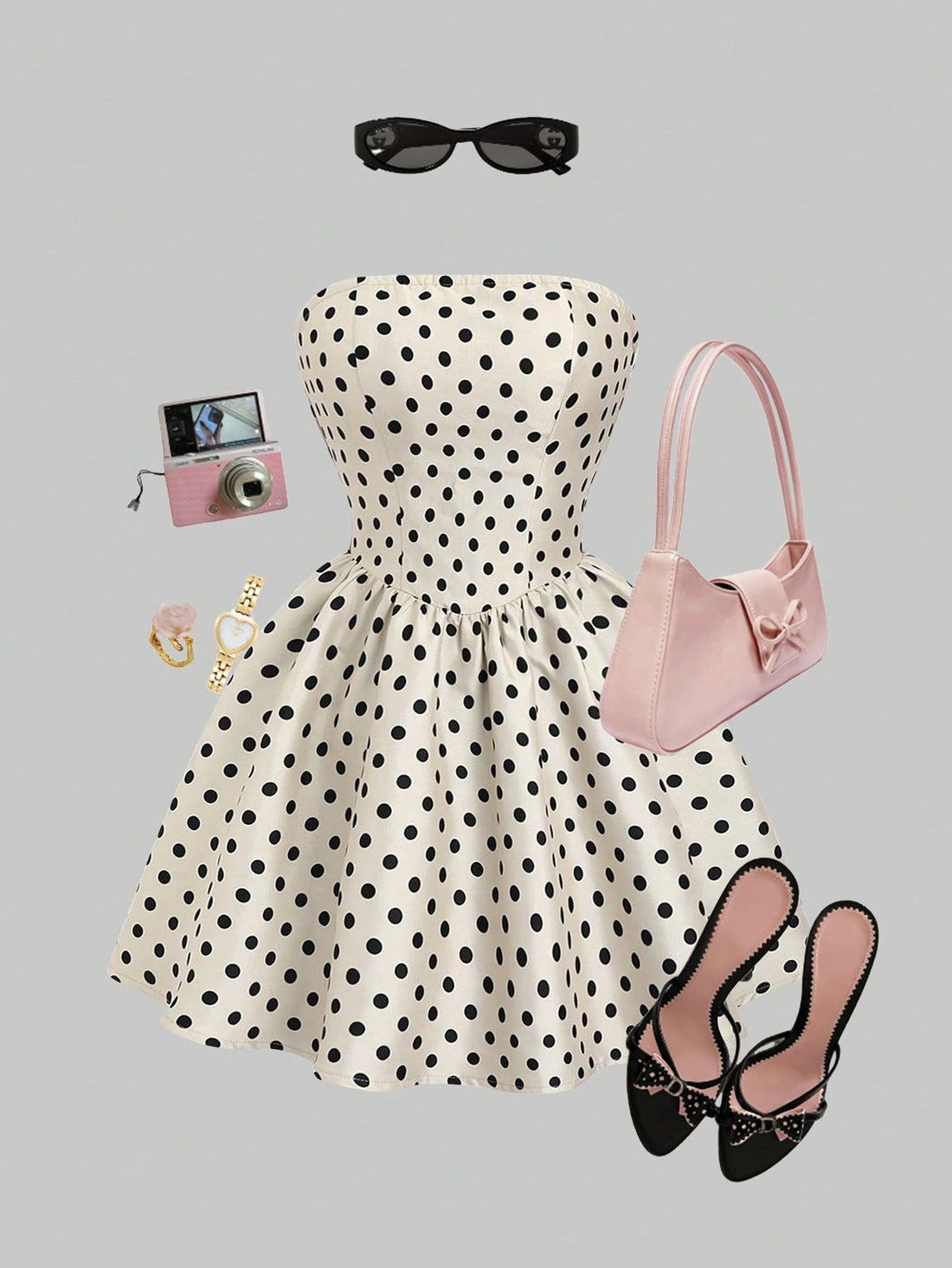 Step out in style with this chic French vintage-inspired mini dress. Featuring a playful polka dot pattern and a trendy tube top design, it perfectly highlights your shoulders. The slimming waist detail flatters your figure, making it ideal for fun days or lively nights. Embrace a flirty, timeless look that’s sure to turn heads wherever you go!
