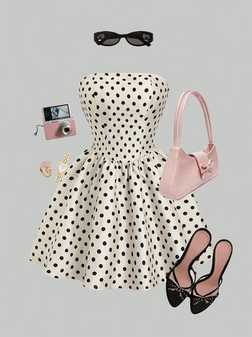 Step out in style with this chic French vintage-inspired mini dress. Featuring a playful polka dot pattern and a trendy tube top design, it perfectly highlights your shoulders. The slimming waist detail flatters your figure, making it ideal for fun days or lively nights. Embrace a flirty, timeless look that’s sure to turn heads wherever you go!