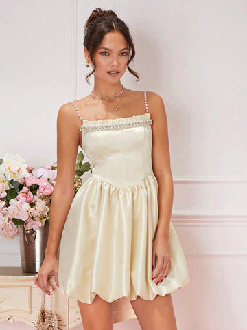 Effortlessly exude elegance with our Chic Frill Trim Cami Dress! Perfect for any occasion, this dress features feminine frill trim and a flattering cami design. Elevate your style with ease and grace.