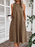 Stay stylish and organized with our Chic & Functional dress. This sleeveless round neck dress features hidden pockets for a discreet storage solution. Perfect for the modern woman on the go.