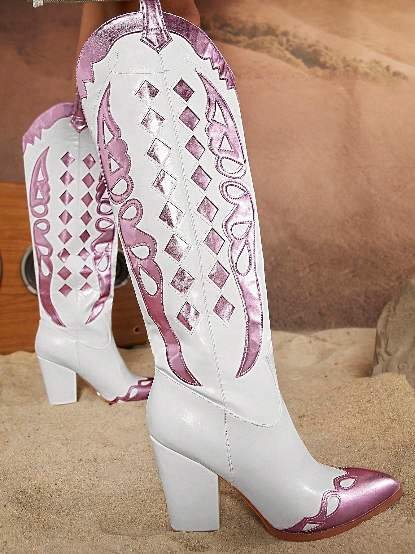 Step up your fashion game with our Chic Geometric-Patterned High-Top White Pointed Toe Boots! Featuring a unique geometric pattern and a trendy high-top design, these boots are sure to make a statement. The pointed toe adds a touch of sophistication to any outfit. Elevate your style today!