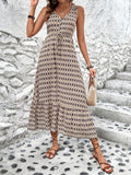 Unleash your inner fashionista with our Chic Geometric Print Maxi Dress! Featuring a playful ruffled hemline and unique geometric print, this dress is perfect for making a statement. Made with high-quality materials from our Clasi Collection, it combines style and comfort effortlessly. (Maxi-mize your style with this dress - no pun intended!)