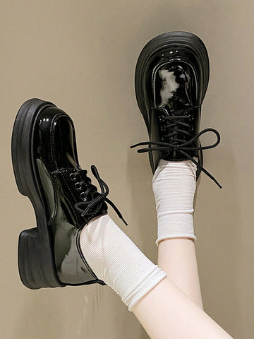 Get ready to step up your shoe game with our Chic Glossy Platform Oxfords! These versatile lace-up shoes will add a touch of effortless elegance to any outfit. Say goodbye to a boring shoe collection and hello to elevated style. (No more "I have nothing to wear" moments!)