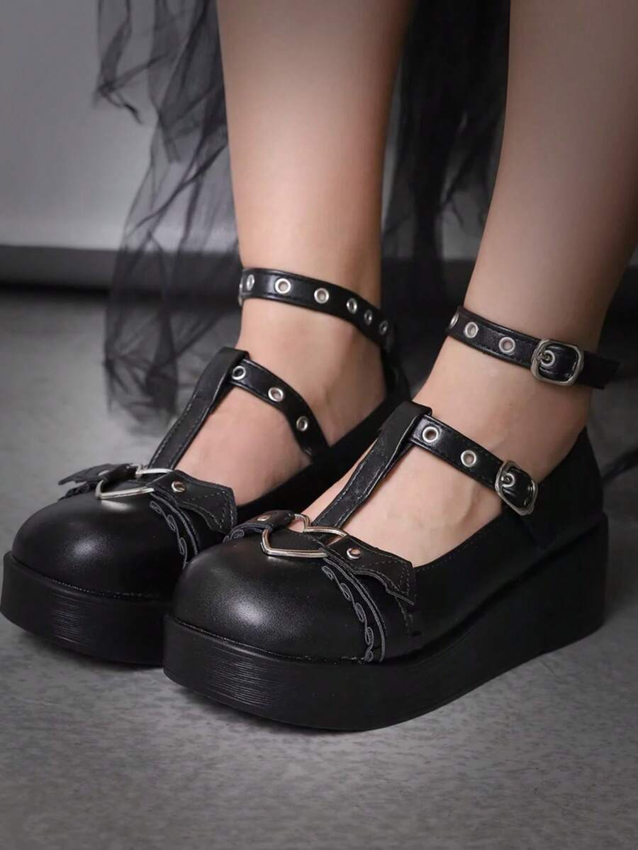 Step into spooky style with these Chic Gothic Mary Jane Shoes! Featuring a classic T-strap and sturdy chunky heels, they’re perfect for Halloween mischief or adding a dark twist to your Valentine’s Day look. Comfortable yet bold, these shoes bring a playful edge to any outfit, making every step a statement. Embrace your gothic charm with footwear that’s as fun as it is fierce!