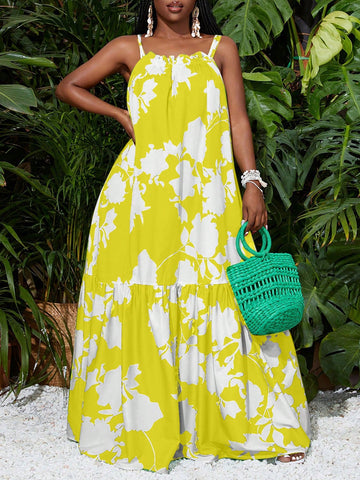 Transform into a summer goddess with our Chic Green Plant Print Maxi Dress. This effortless style features a vibrant print of lush green plants, perfect for your next beach day or outdoor event. Embrace the warm weather in style and comfort.
