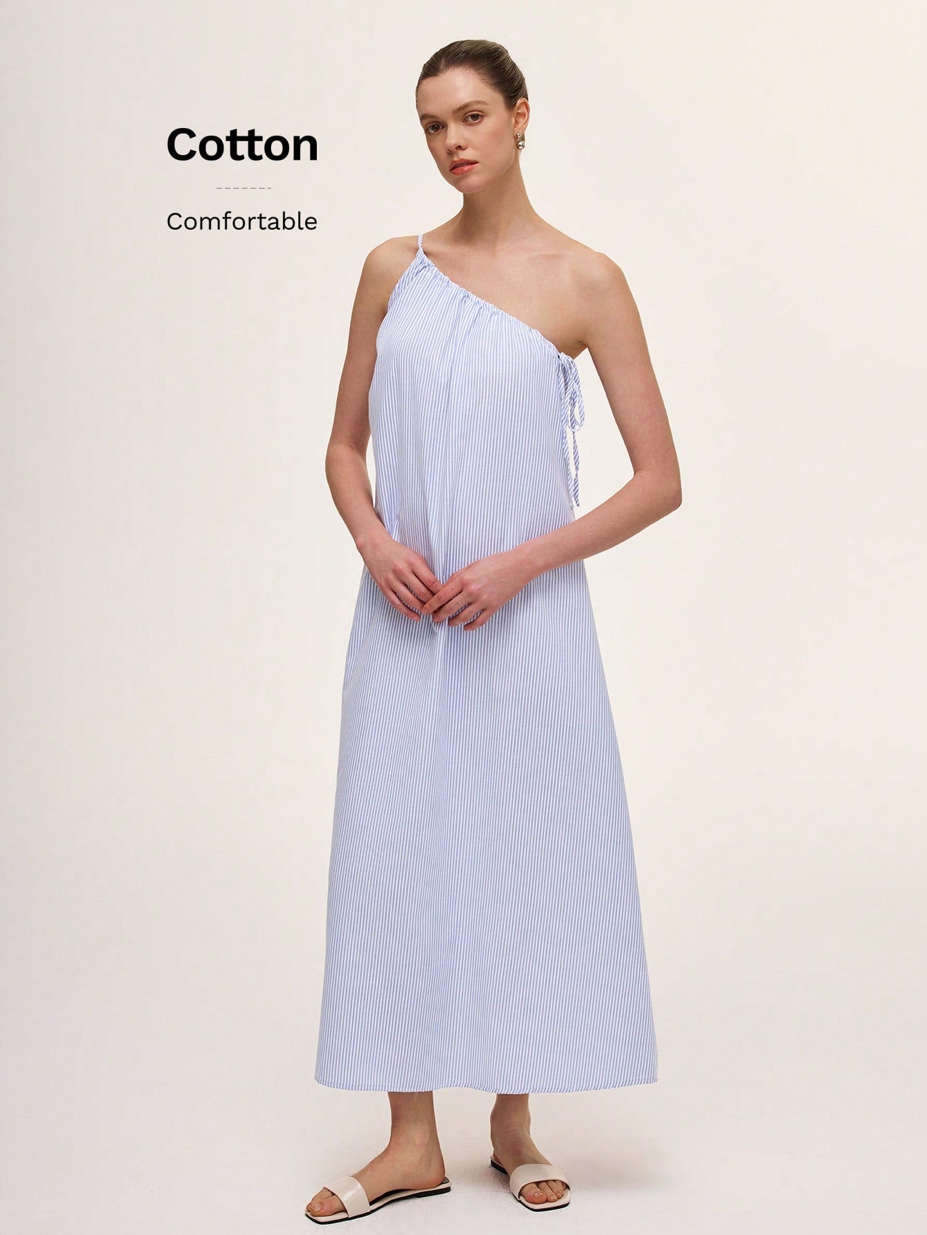 Step out in style with this chic green striped dress featuring a playful asymmetric neckline and sleeveless design. Its unique cut adds a fun twist to elegance, perfect for turning heads at any event. Lightweight and flattering, it’s your go-to for effortless sophistication with a splash of personality.