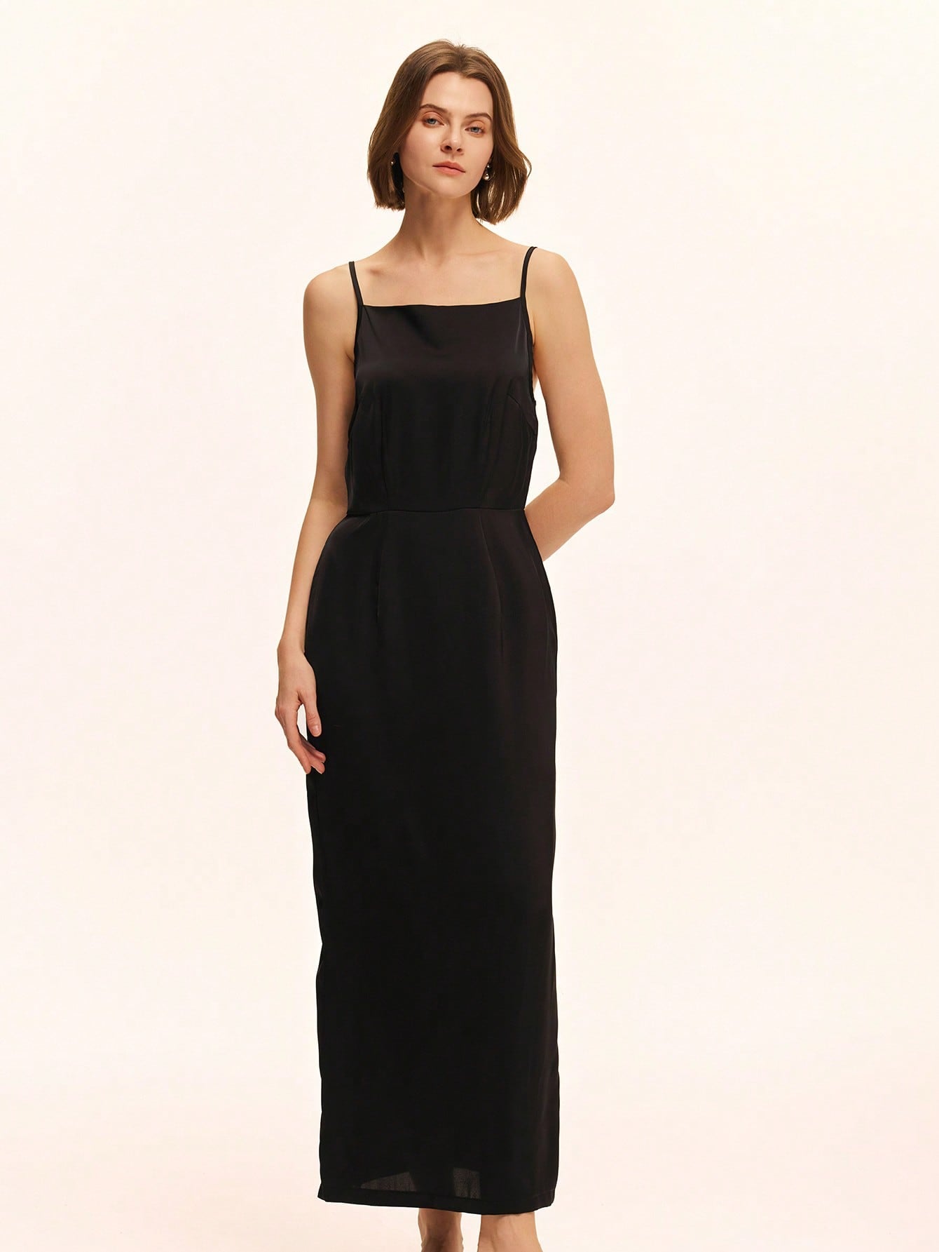 Step out in style with this chic green tweed open back cami dress. Its playful design and vibrant color make it a standout choice for any occasion, from brunch dates to evening soirees. The open back adds a flirty touch, while the tweed fabric keeps it classy and comfortable. Perfect for turning heads wherever you go!