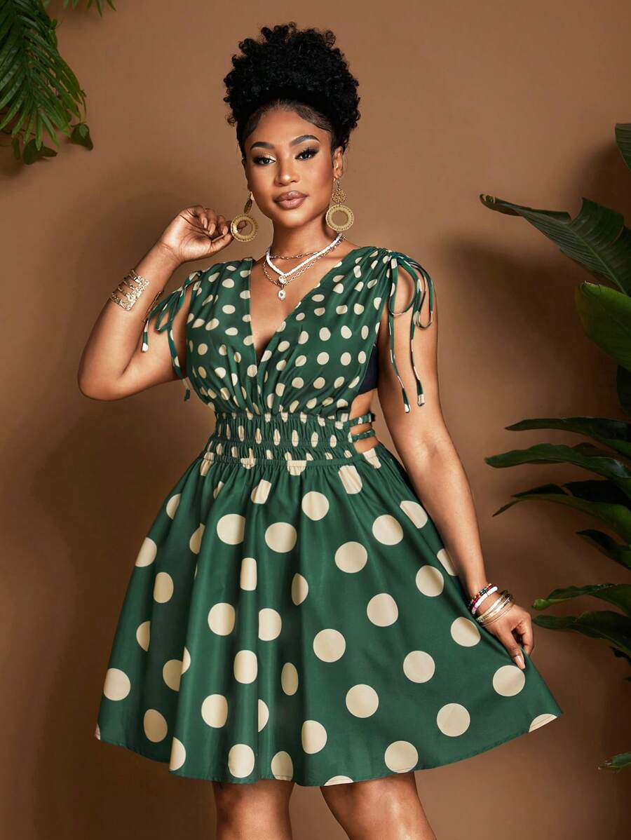 Exude Sun-Drenched Sophistication in Our Chic Green V-Neck Polka Dot Plus Size Dress!

Experience the breathtaking fusion of heritage pattern artistry and sharp, modern architectural tailoring. This stunning emerald-toned ensemble is meticulously designed for the woman who values a high-fashion, "quiet luxury" approach to seasonal dressing—the ultimate centerpiece for prestigious festive retreats, exclusive garden soirées, and high-authority holiday outings.

Iconic Polka Dot Artistry: Featuring a masterful