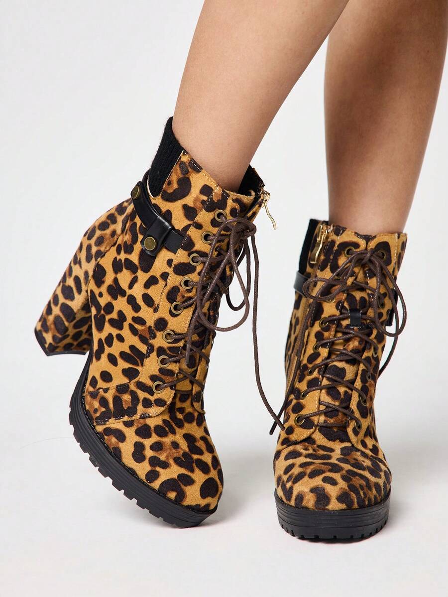 Make a bold statement with these edgy Chic Grunge Punk Leopard Print High Heel Ankle Boots. Featuring a striking leopard print design combined with rebellious studded buckle detailing, these boots deliver attitude and style in one fierce package. The sleek high heel silhouette elongates your legs while the ankle-cut design offers versatile styling options. Perfect for adding an edge to any outfit, from casual streetwear to night-out looks.