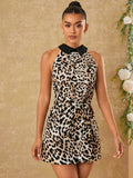 Turn heads effortlessly in this chic halter mini dress featuring a bold leopard print and a sleek belt to cinch your waist. Its sleeveless design keeps things cool and flirty, perfect for day-to-night fun. Embrace your wild side with a playful statement that’s as fierce as you are.
