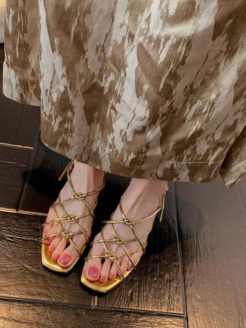 Step into summer with these chic handmade French sandals, featuring a delicate hollow-out design in shimmering gold. Perfect for sunny days and stylish outings, they add a playful sparkle to any outfit while keeping your feet cool and comfortable. Embrace effortless elegance with every step!