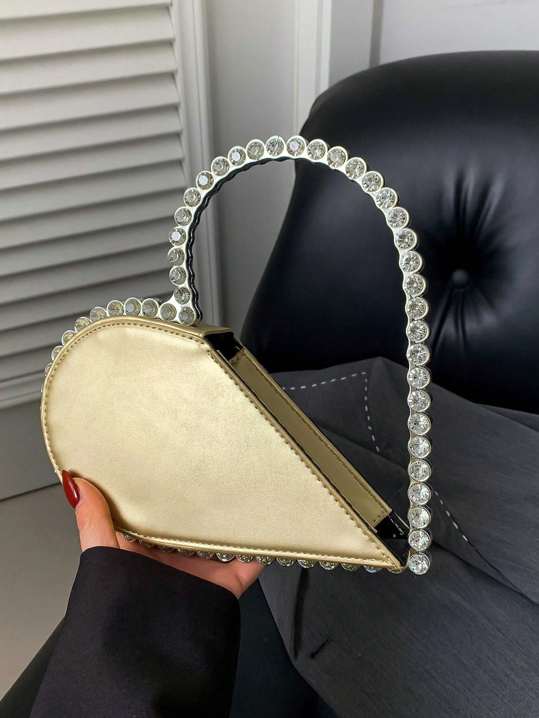 Elevate your style on special occasions with our Chic Heart-Shaped Evening Bag! This gorgeous clutch is the perfect accessory for weddings, parties, and Valentine's Day. Its heart-shaped design brings a romantic touch to any outfit, while its compact size allows for easy carrying. Make a statement and impress others with this must-have accessory!