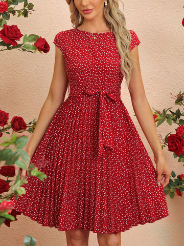 Stand out in style with our Chic Heart Print Belted Pleated Polka Dot Dress! With a flattering belted waist and playful polka dot pattern, this dress is perfect for fashionistas looking to make a statement. Pair with heels and your favorite accessories for a look that's both chic and playful.