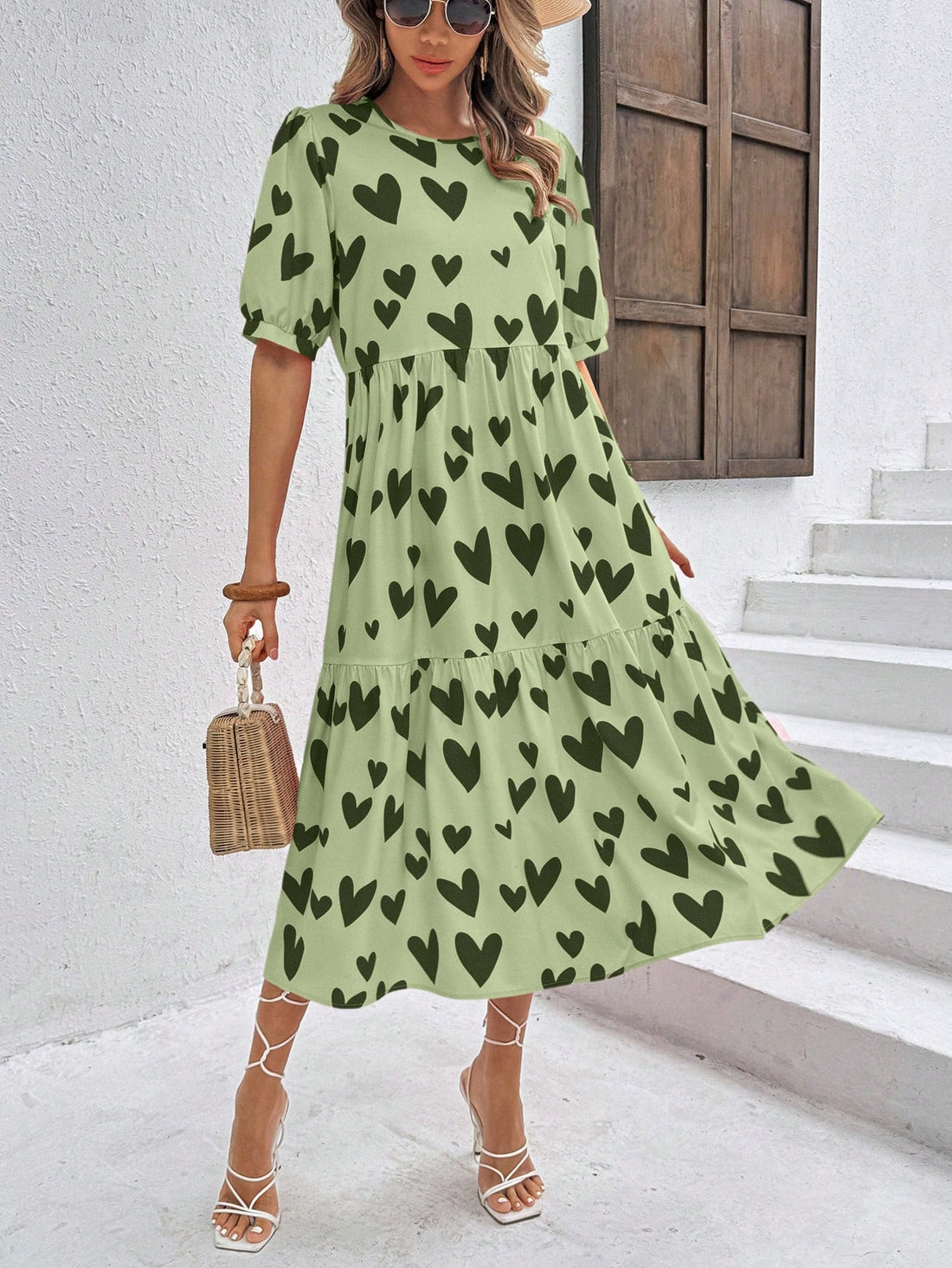 Elevate your everyday style with our Chic Heart Print Casual Dress. Designed for effortless wear, this dress features a charming heart print that adds a touch of fun to your look. Its comfortable fit makes it perfect for everyday wear and will have you feeling confident and stylish all day long.