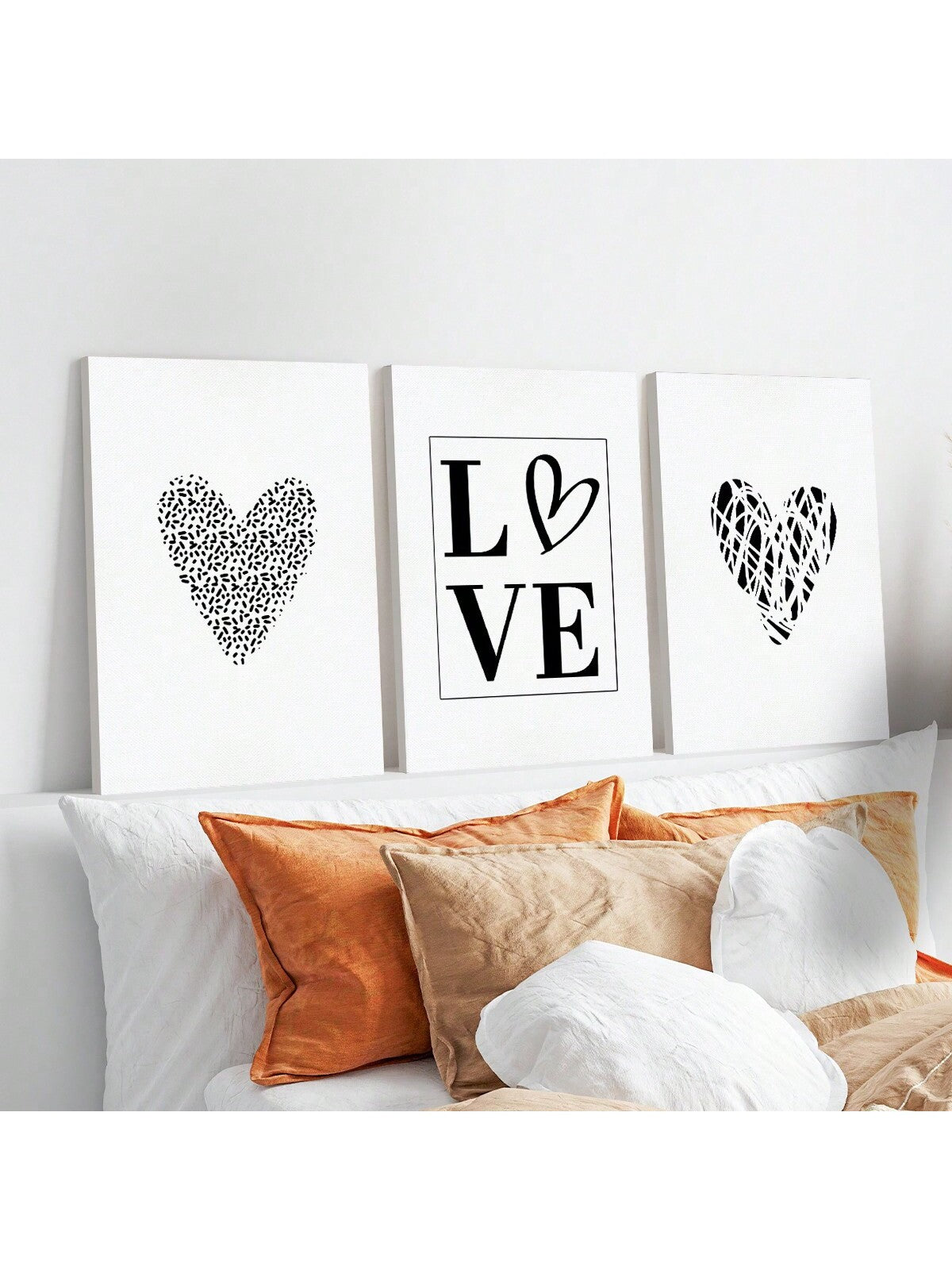 Add some love to your walls with our Chic Heart Wall Art Set! These black and white prints are perfect for your modern home decor. Take your walls from bland to grand in no time.