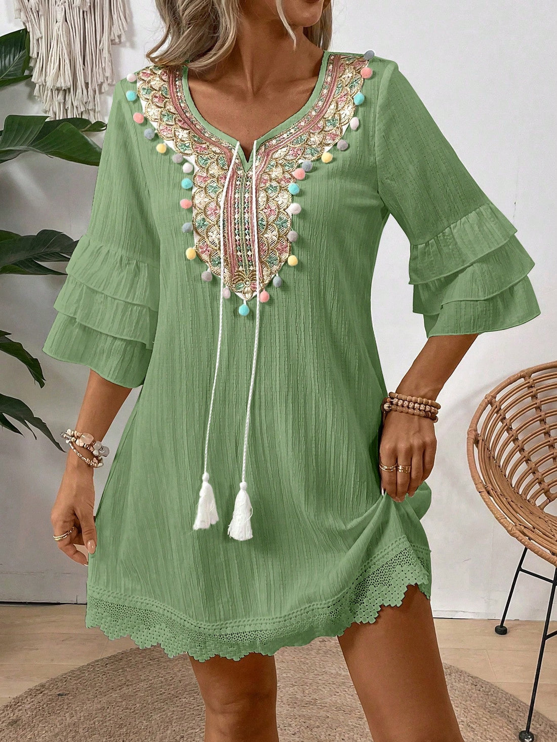 Elevate your holiday style with our Chic Holiday Floral Embroidery Dress. Featuring delicate floral embroidery, tassel ties, and playful pom-pom details, this dress is perfect for any festive occasion. Crafted with care and attention to detail, this dress will make you feel chic and confident all season long.