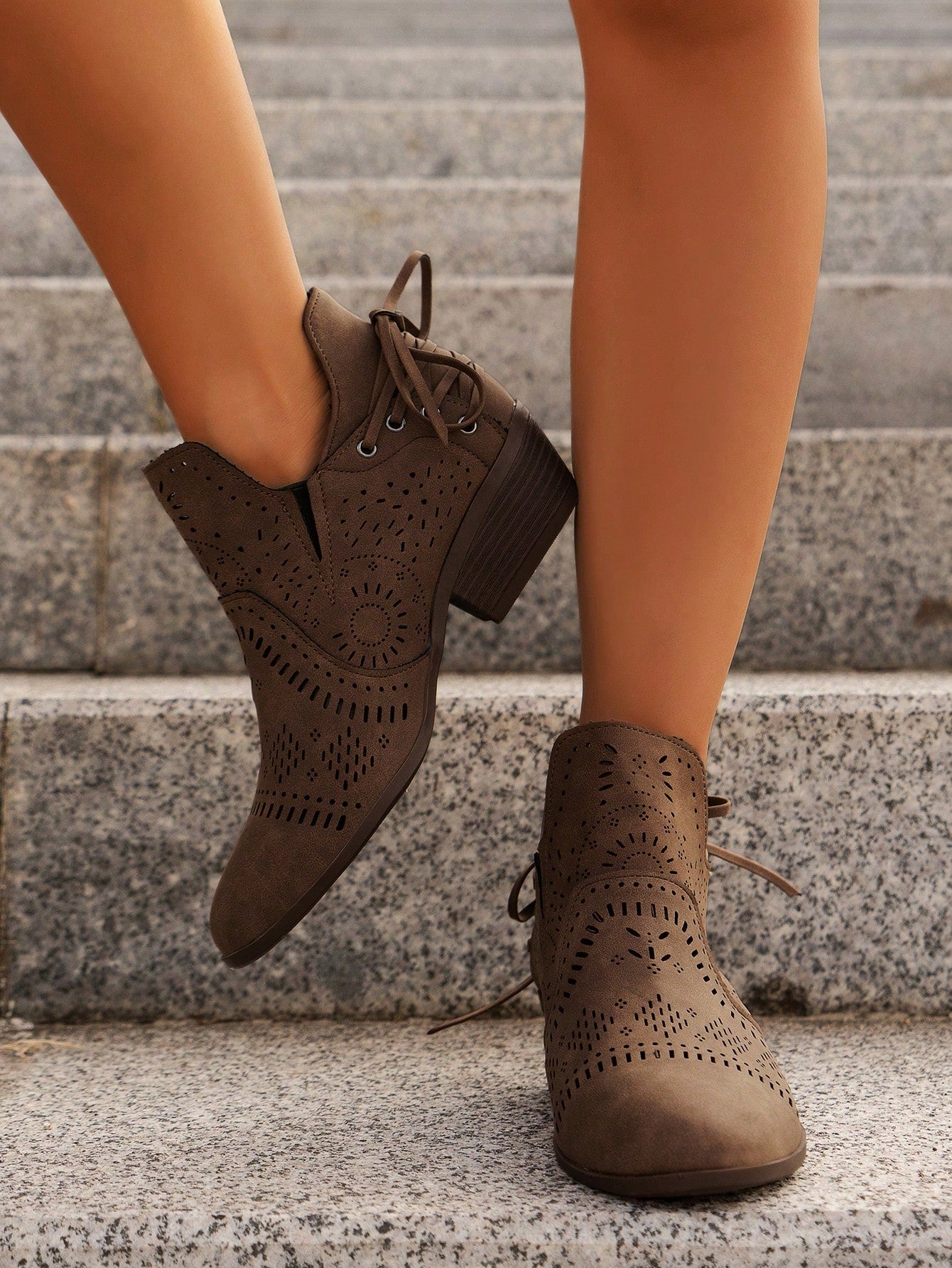 Elevate your style effortlessly with our Chic Hollow-Out Back Lace-Up Wedge Heels. Crafted with breathable material, these versatile boots are perfect for any occasion. The unique lace-up design adds a touch of sophistication, while the wedge heels provide comfortable elevation. Make a statement with these all-match boots.