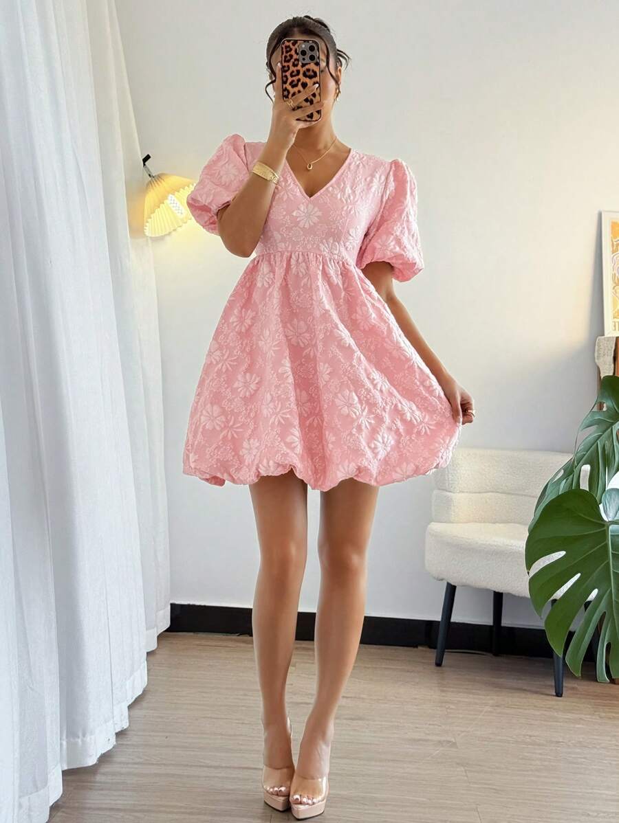 Add some playful elegance to your wardrobe with our Chic Jacquard Floral Balloon Sleeve Mini Dress. The A-Line style adds a flattering touch while the vibrant floral pattern and balloon sleeves make a stylish statement. Perfect for any occasion, this dress will have you feeling chic and confident!