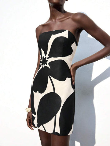 Turn heads wherever you go with this playful khaki floral print tube top mini dress. Light and breezy, it’s your perfect vacation companion or party standout. The flattering tube top style pairs effortlessly with sandals or heels, making every step feel like a dance. Embrace fun and sun in a dress designed to keep your vibe carefree and chic.