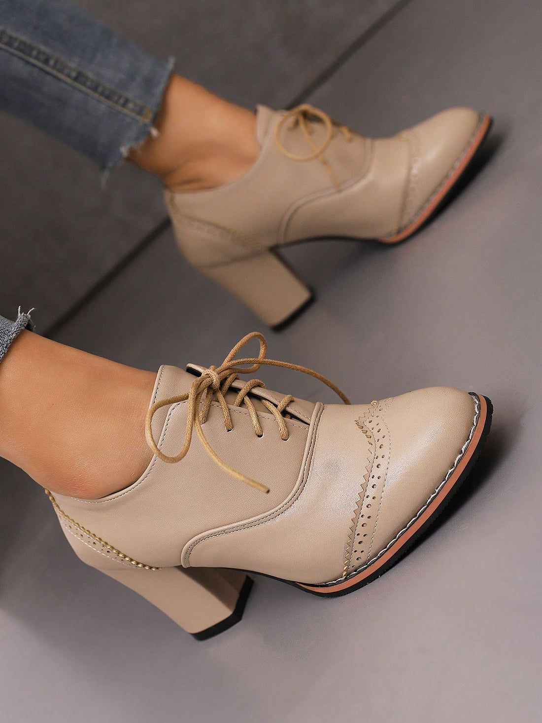 Step out in style with these Chic Khaki Striped Brogue High Heel Pumps! Crafted from smooth PU leather, they blend classic British charm with a modern twist. The playful khaki stripes add a fun edge, while the high heels give you that confident lift. Perfect for turning heads at any occasion, these pumps bring a dash of sophistication and a splash of personality to your wardrobe.