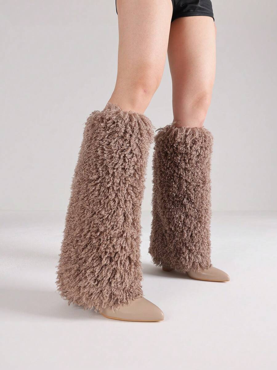 Step out in style with these chic knee-high faux fur boots designed just for women who love comfort and flair. Featuring a pointed toe and chunky heels, they add a playful edge to any outfit while keeping your feet cozy and supported. Perfect for turning heads and staying warm all day long!