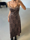 Step out with confidence in this playful knee-length leopard slip dress. Featuring a casual cheetah print, it blends bold style with effortless comfort. Perfect for any occasion, this dress adds a touch of wild charm to your wardrobe while keeping things light and easy. Embrace your fierce fashion side with a look that’s both fun and effortlessly chic.