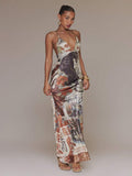 Front view of floral and panther print lace-up maxi dress with deep V neckline
