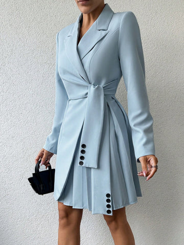 Upgrade your wardrobe with our Chic Lapel Neck Knot Side Wrap Blazer Dress. Designed for any occasion, this dress exudes effortless elegance. With a sleek lapel neck, side wrap details, and a stylish knot, you'll feel confident and chic. Elevate your style and make a lasting impression!