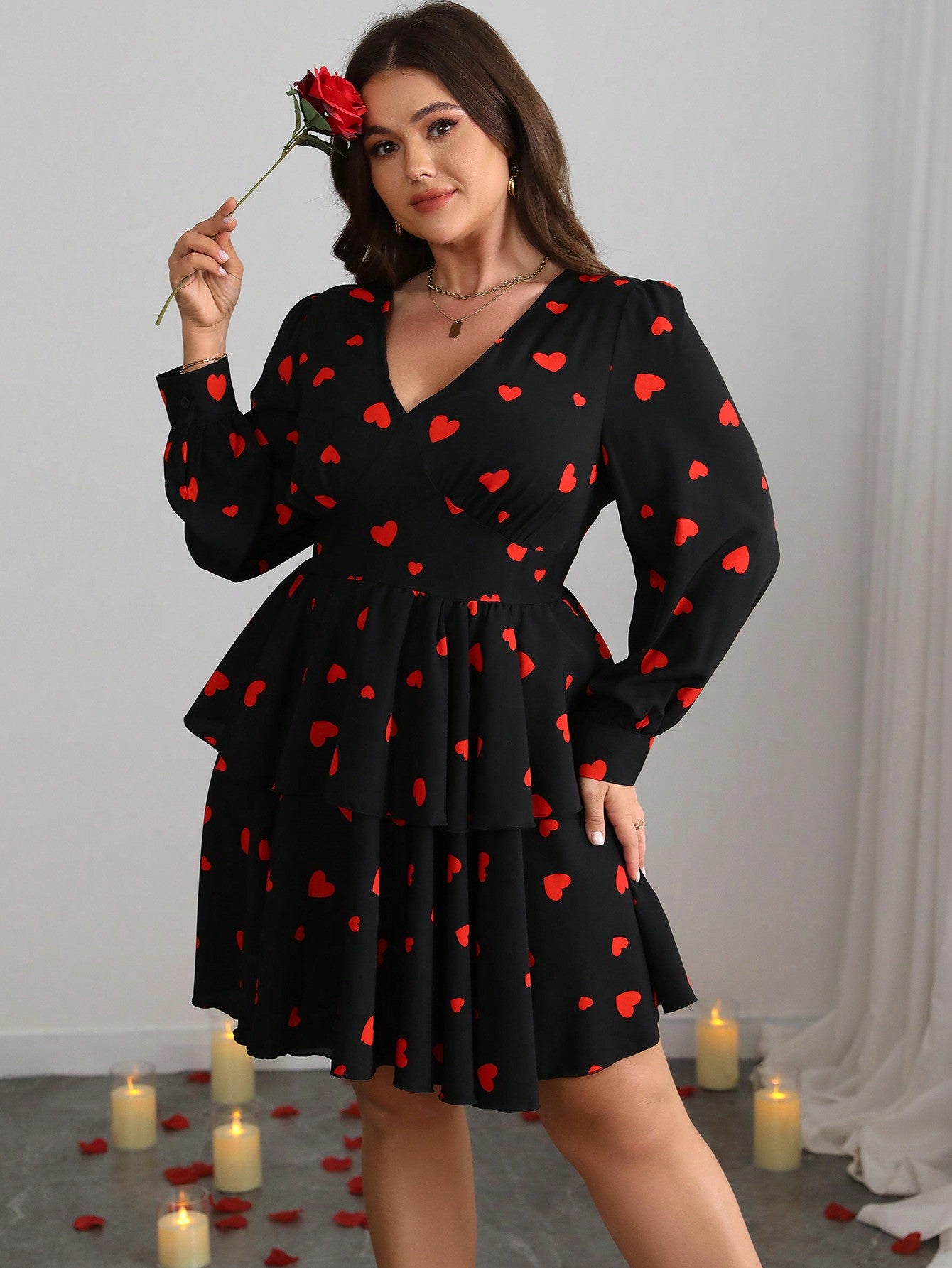 Get ready to steal hearts in this chic plus size dress with layered heart accents – perfect for Valentine's Day or any day! Show off your curves in this flattering and stylish dress that is sure to turn heads. Spread love and confidence with this must-have addition to your wardrobe!