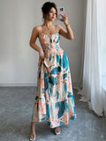 Embrace your inner free spirit with this stunning leaf print maxi dress that's basically summer in fabric form. The delicate spaghetti straps keep things breezy and effortless, while the flowing silhouette glides beautifully with every step. Perfect for lazy beach days, garden parties, or whenever you want to look put-together without actually trying. The botanical print adds just the right touch of nature-inspired charm to elevate your warm-weather wardrobe. Slip it on and let the good vibes follow.