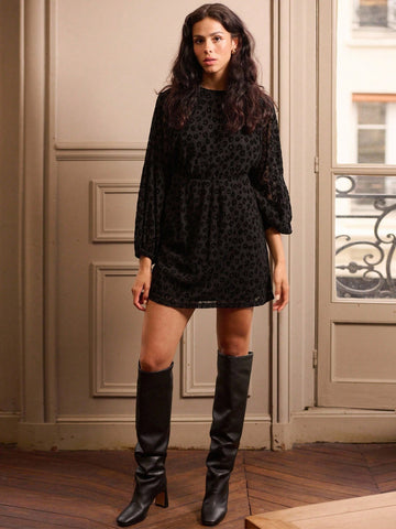 Turn heads this season in our Chic Leopard Jacquard Mini Dress—a playful take on timeless animal print. The voluminous balloon sleeves add a touch of drama and movement, while the cheeky keyhole cutout at the back keeps things flirty and fun. Crafted in luxe jacquard fabric, this mini hugs in all the right places and transitions seamlessly from cozy fall evenings to winter nights out. Whether you're dressing it up with heels or keeping it casual with sneakers, this dress is your go-to piece for making a sta