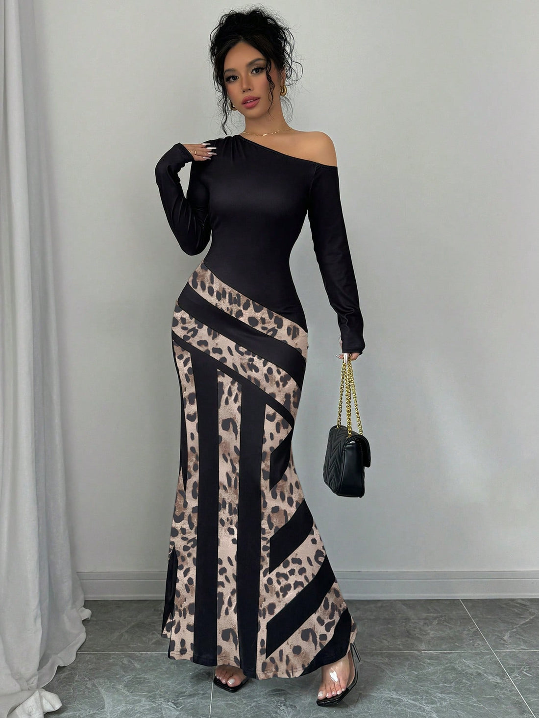 Introducing our Chic Leopard Patchwork Fishtail Dress, featuring a stylish V-neck design for a sultry look. With a unique leopard patchwork pattern, this dress is sure to make a statement. Perfect for any occasion, its flattering fishtail silhouette will enhance your curves. Upgrade your wardrobe with this must-have piece.