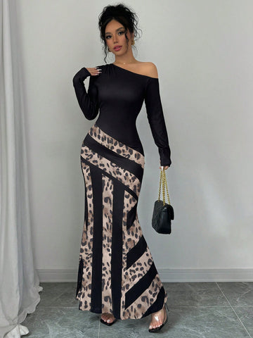 Introducing our Chic Leopard Patchwork Fishtail Dress, featuring a stylish V-neck design for a sultry look. With a unique leopard patchwork pattern, this dress is sure to make a statement. Perfect for any occasion, its flattering fishtail silhouette will enhance your curves. Upgrade your wardrobe with this must-have piece.