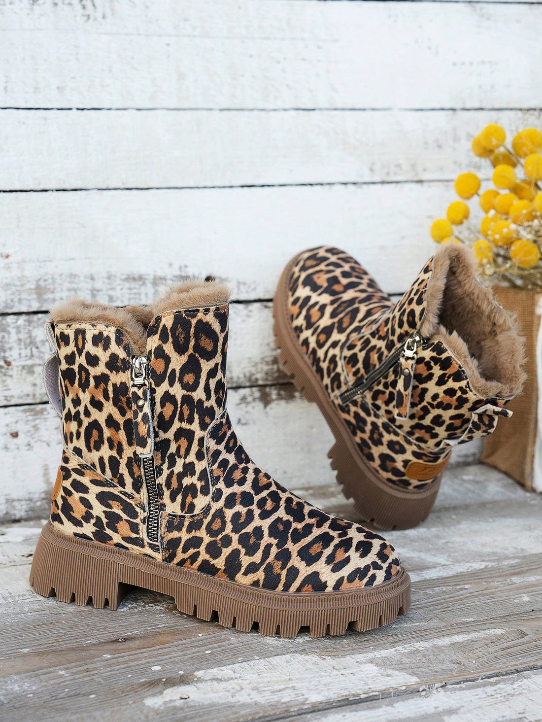Stay stylish and warm this winter with our Chic Leopard Print Ankle Snow Boots. Featuring a cozy fur lining, these boots are perfect for the colder months. With a trendy leopard print design, you'll be sure to make a statement while staying comfortable in the snow.
