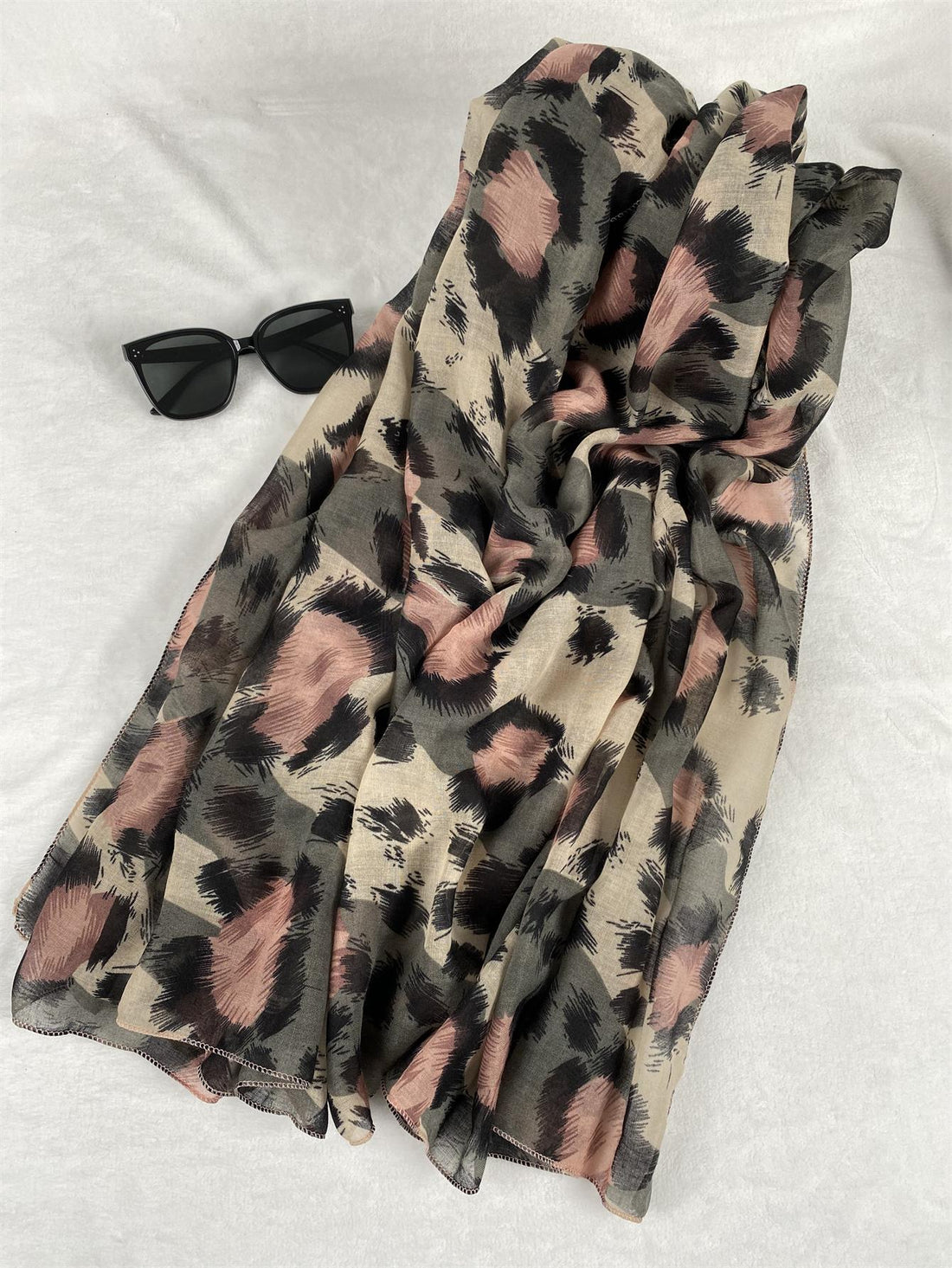 Elevate your daily style with our Chic Leopard Print Boho Scarf. Made with a versatile design, this accessory effortlessly adds a touch of edgy charm to any outfit. Crafted with high-quality materials, this scarf offers both style and comfort. Perfect for any occasion, upgrade your wardrobe with this must-have accessory.